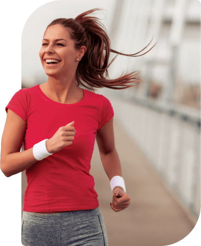 Lady running outdoors smiling