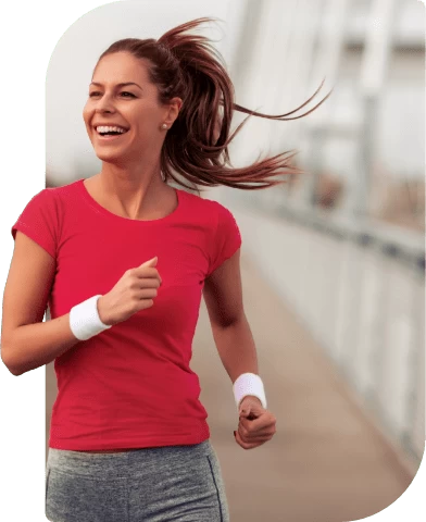 Lady running outdoors smiling